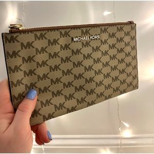 Never used before Michael Kors Wrist Wallet!